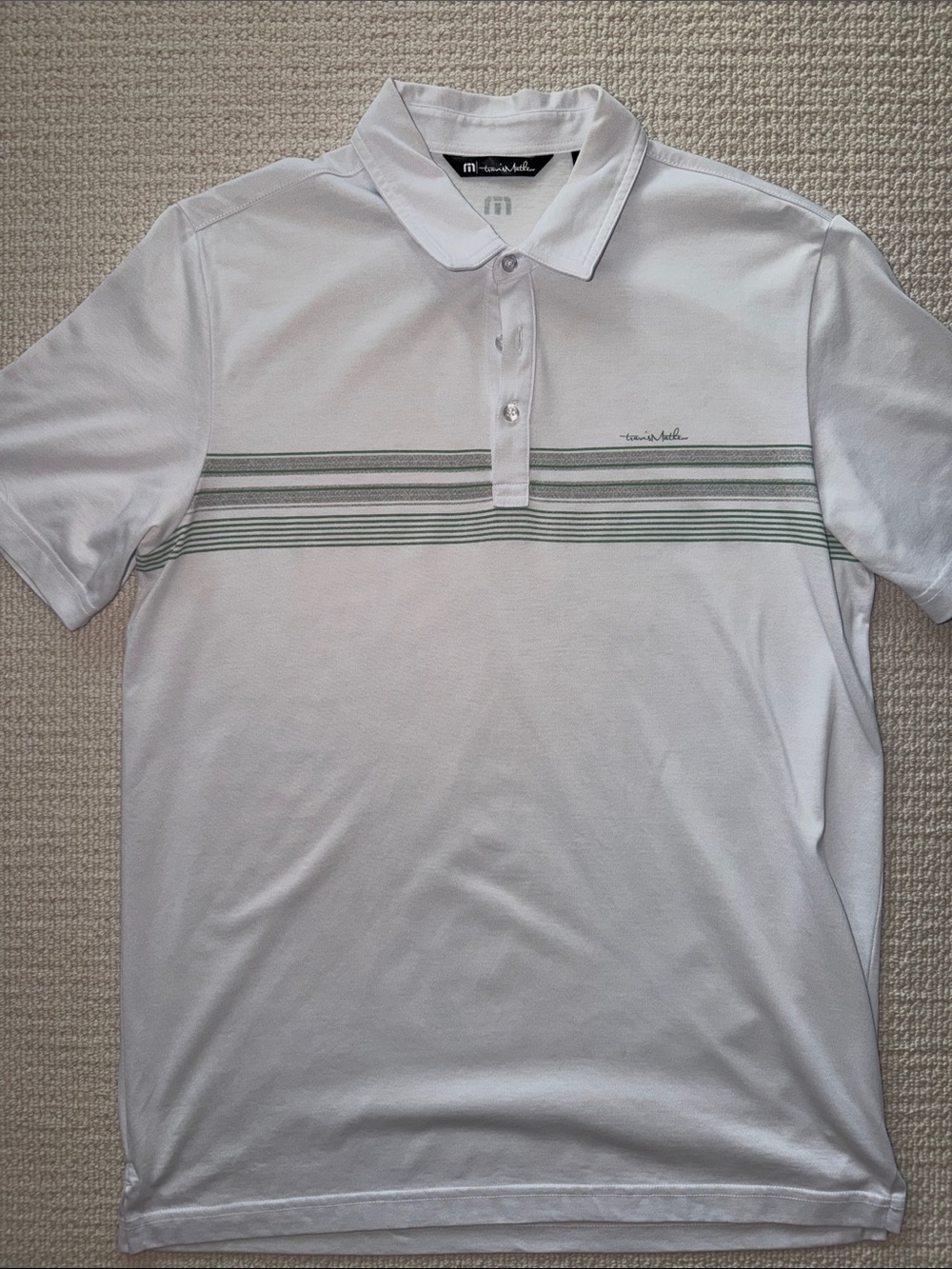 Travis Mathew White Polo with Subtle Green Stripes